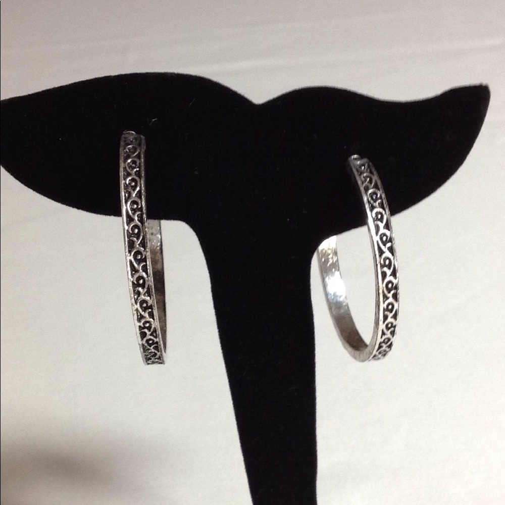 Silver toned loop earrings
